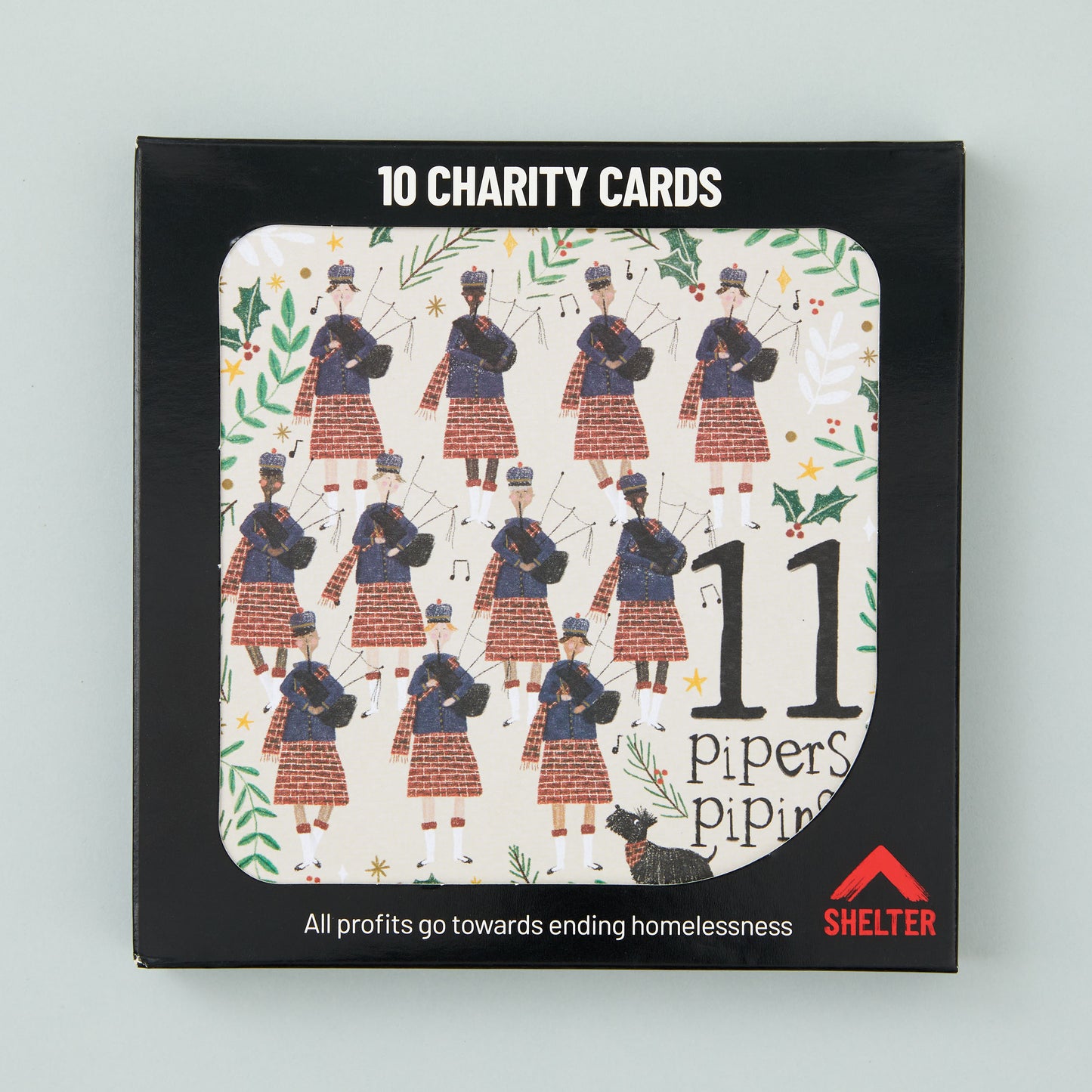 Pack of 10 '11 Pipers' Christmas cards in a black Shelter branded card box.