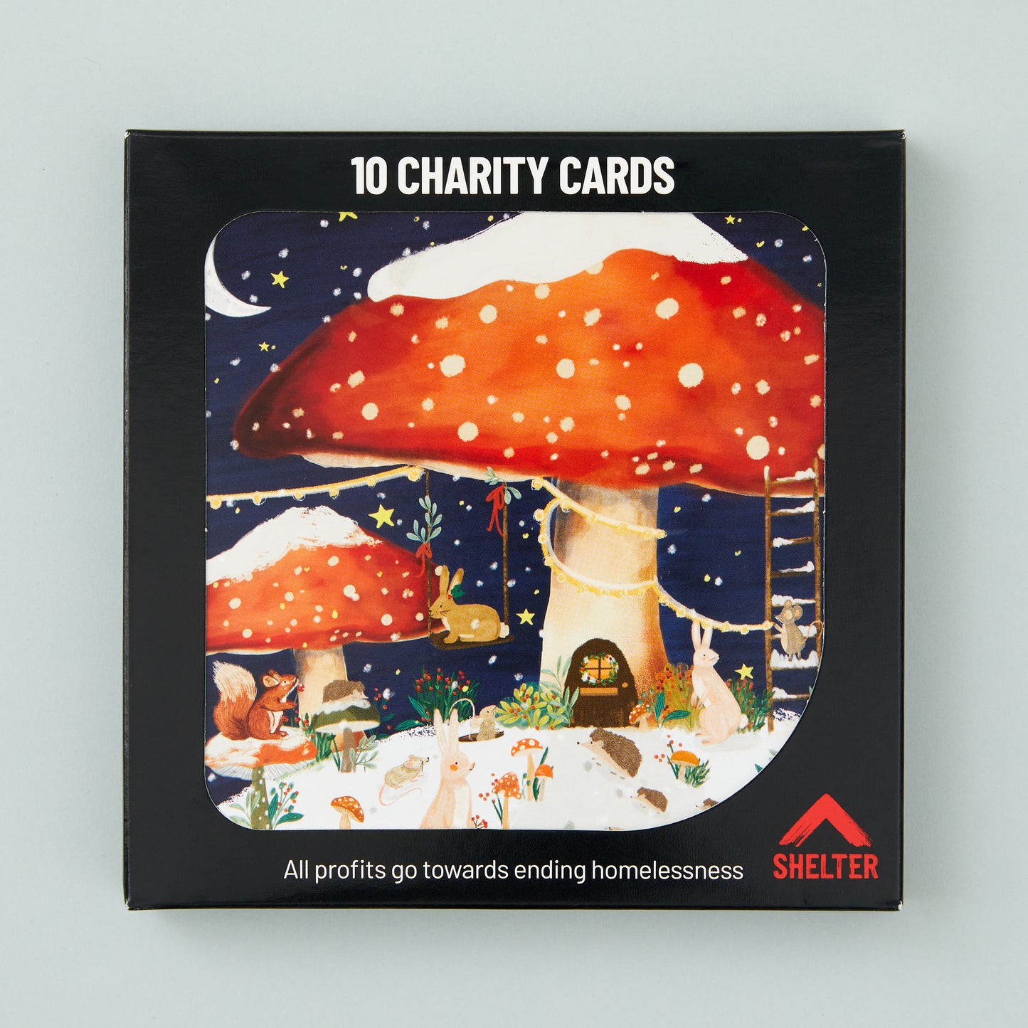 Pack of 10 'Toadstool Townstool' Christmas cards in a black Shelter branded card box.
