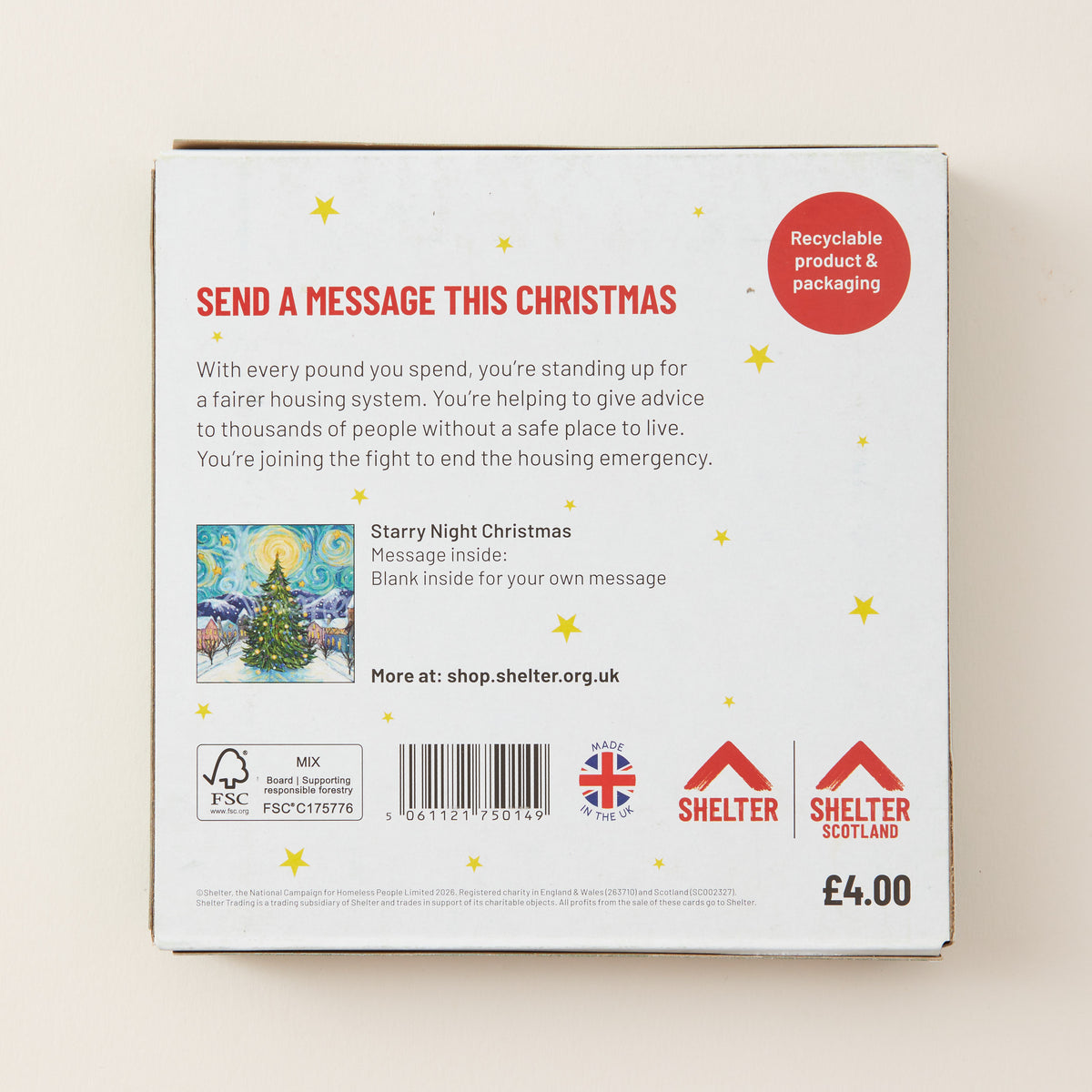 Back of a 'Starry Night Christmas' message card package, showing text, a barcode, a small illustration of a Christmas tree, and Shelter branding on a light beige background.