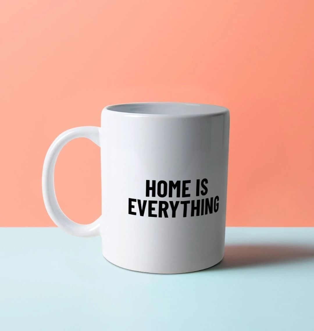 White mug with the slogan 'Home is Everything'