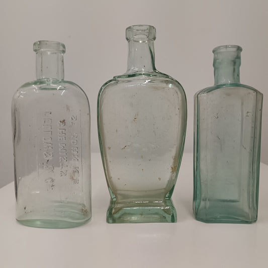 Three Collectable Victorian Green Glass Bottles