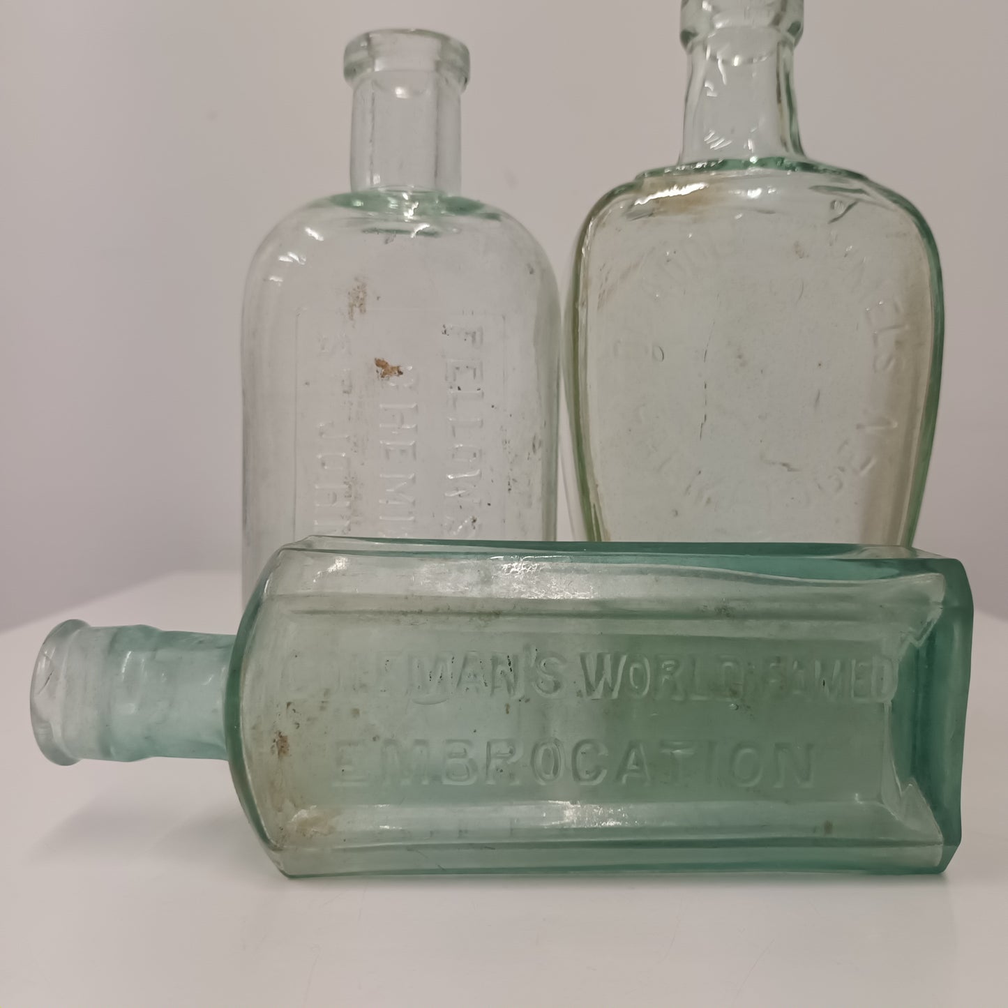 Three Collectable Victorian Green Glass Bottles