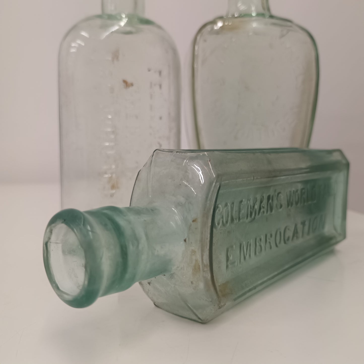 Three Collectable Victorian Green Glass Bottles