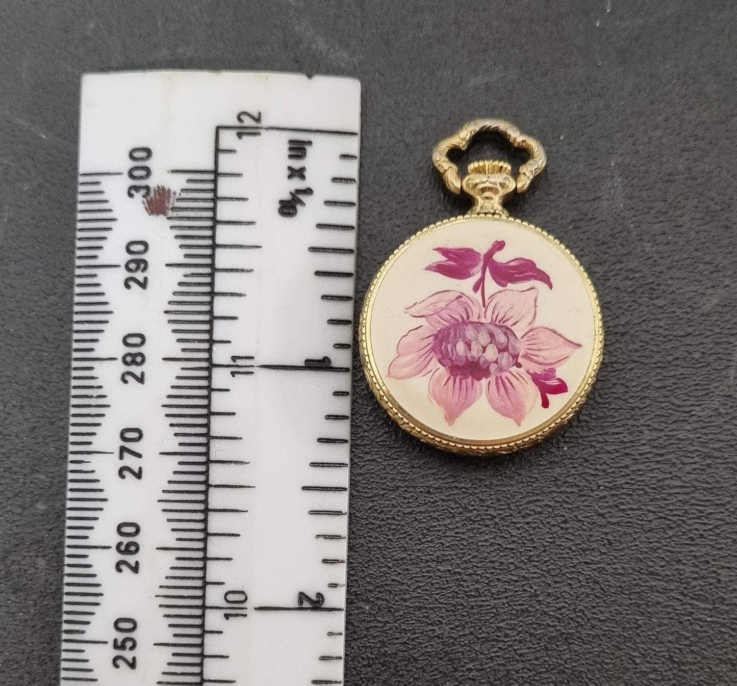 Verity Cased Golden Floral Pendant Wind-Up Watch