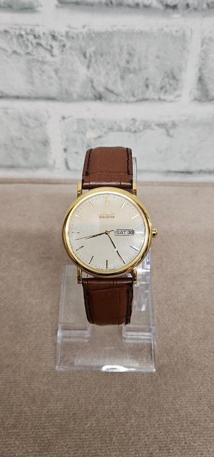 Citizen Eco-Drive Gold Face Brown Strap Wrist Watch