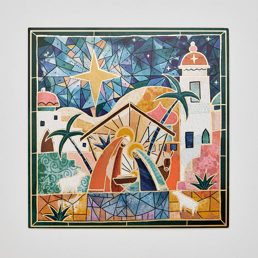 flat lay of christmas card depicting a colourful holy night scene