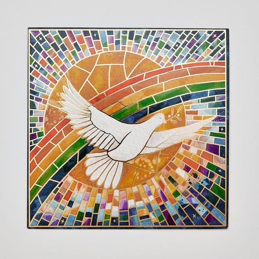 Flat lay christmas card depicting a rainbow sunburst dove