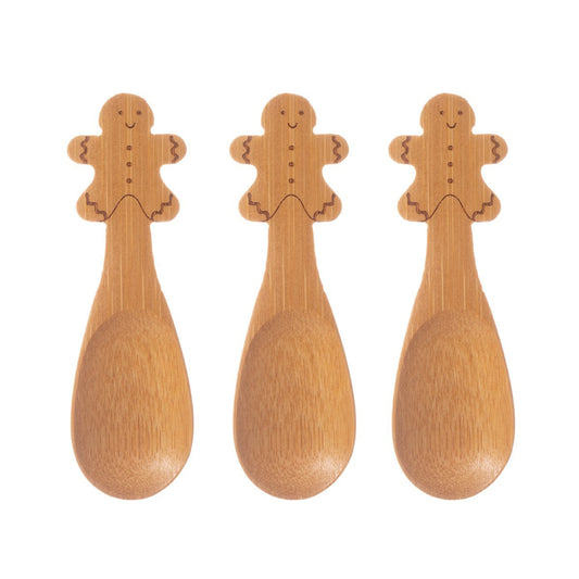 This image shows 3 bamboo spoons with Ginger Bread men engraved at handle where you hold the spoon.