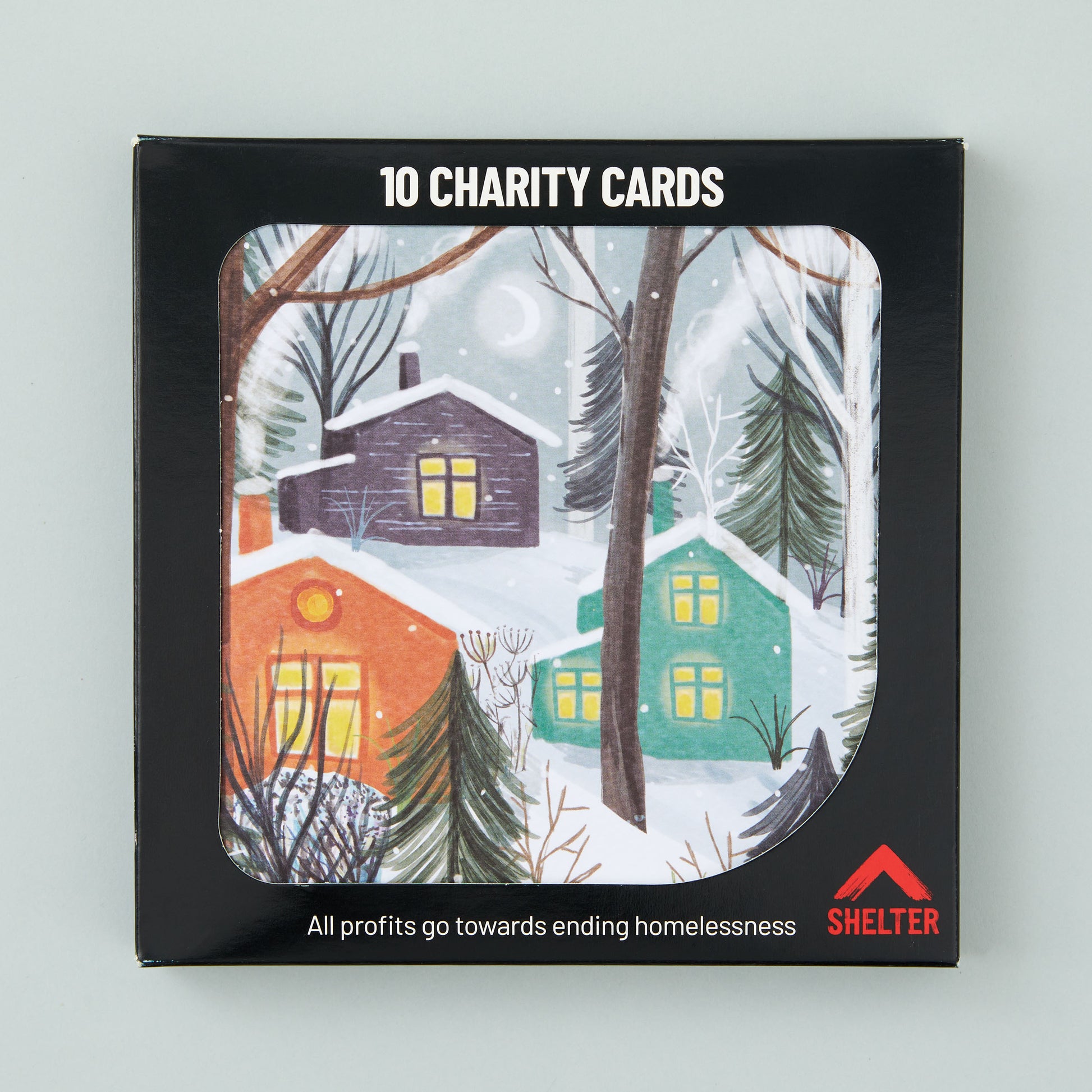 Pack of 10 'Nordic Village' Christmas cards in a black Shelter branded card box. 