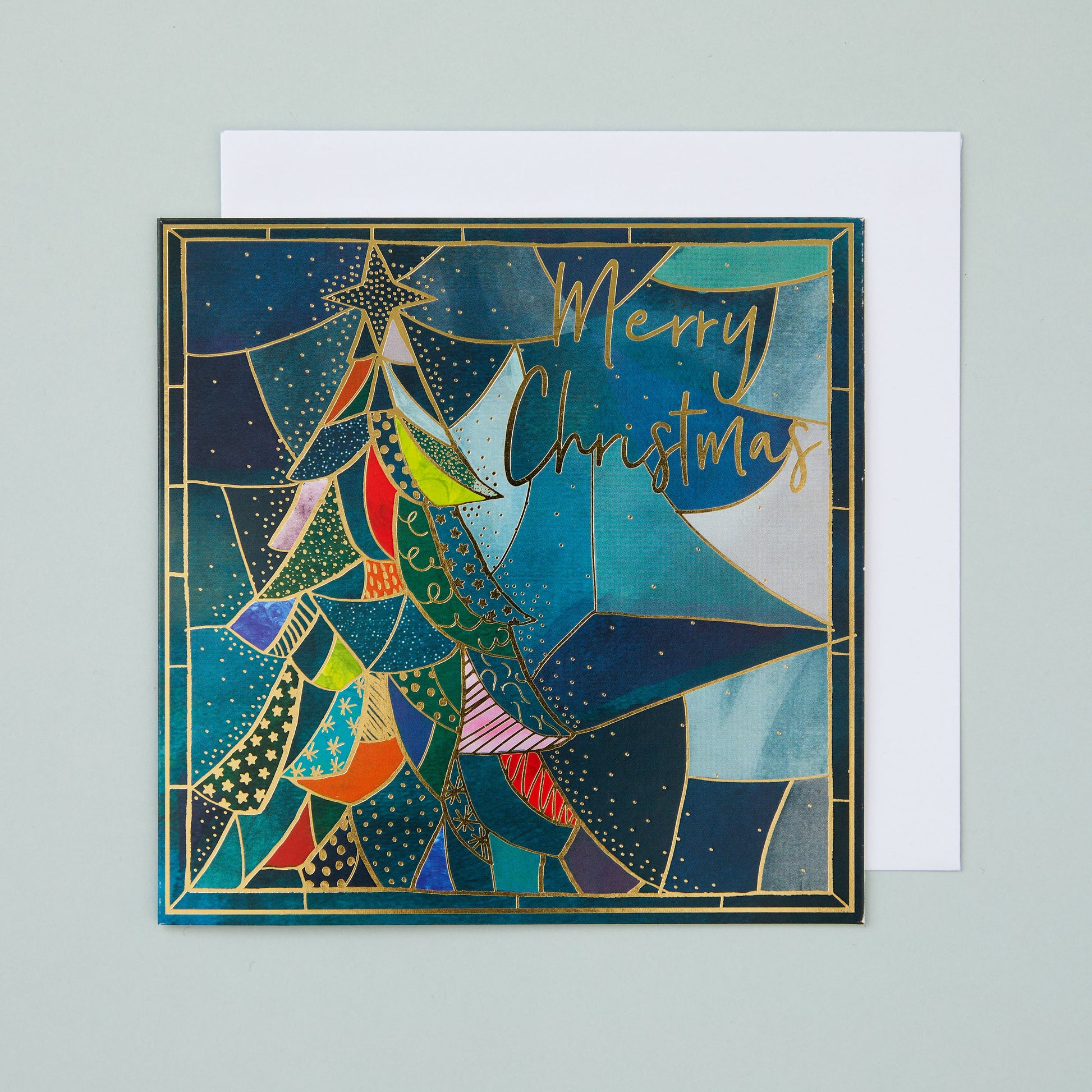 A square Christmas card with a design of a stained glass style Christmas tree.