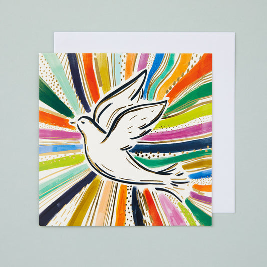 A square Christmas card with a rainbow burst design, featuring a dove in the centre and gold foiled detail. 