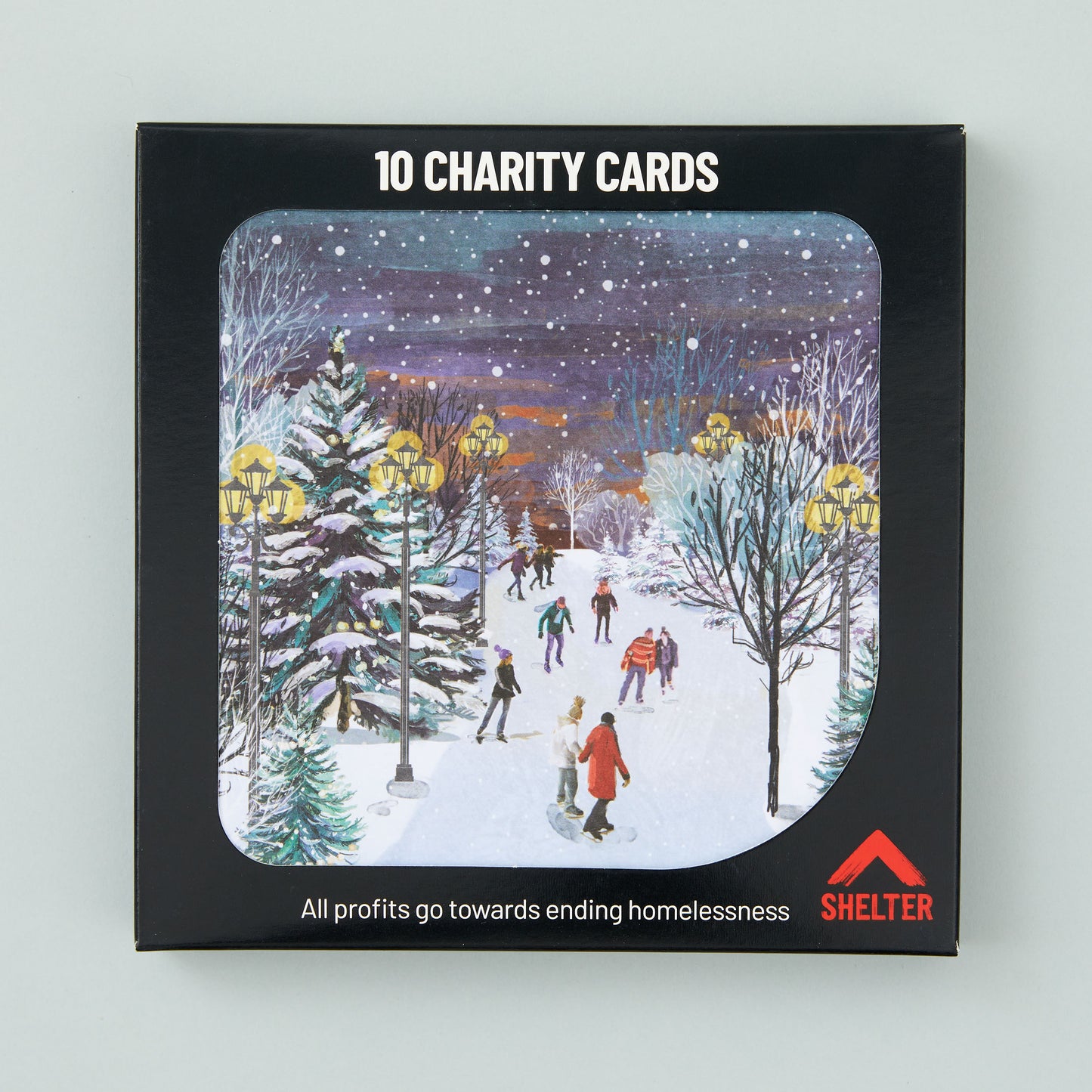 Pack of 10 'Skating on the Stream' Christmas cards in a black Shelter branded card box. 