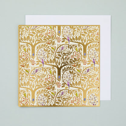 A square Christmas card with gold foiled trees design, detailed with purple, blue and red birds and flowers.