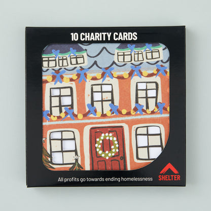 Pack of 10 'Stand Up House' Christmas cards in a black Shelter branded card box. 