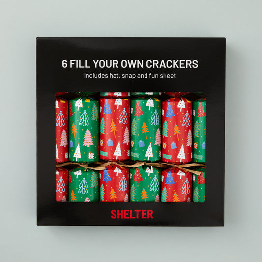 A box of 6 Christmas crackers with red and green Christmas tree design in a card Shelter branded box.