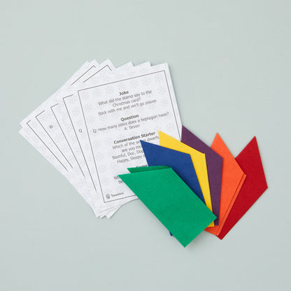 Paper hats and joke / question / conversation starter slips