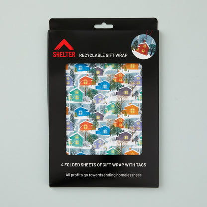 Pack of four sheets of gift wrap and matching tags packaged in a card Shelter branded box. 