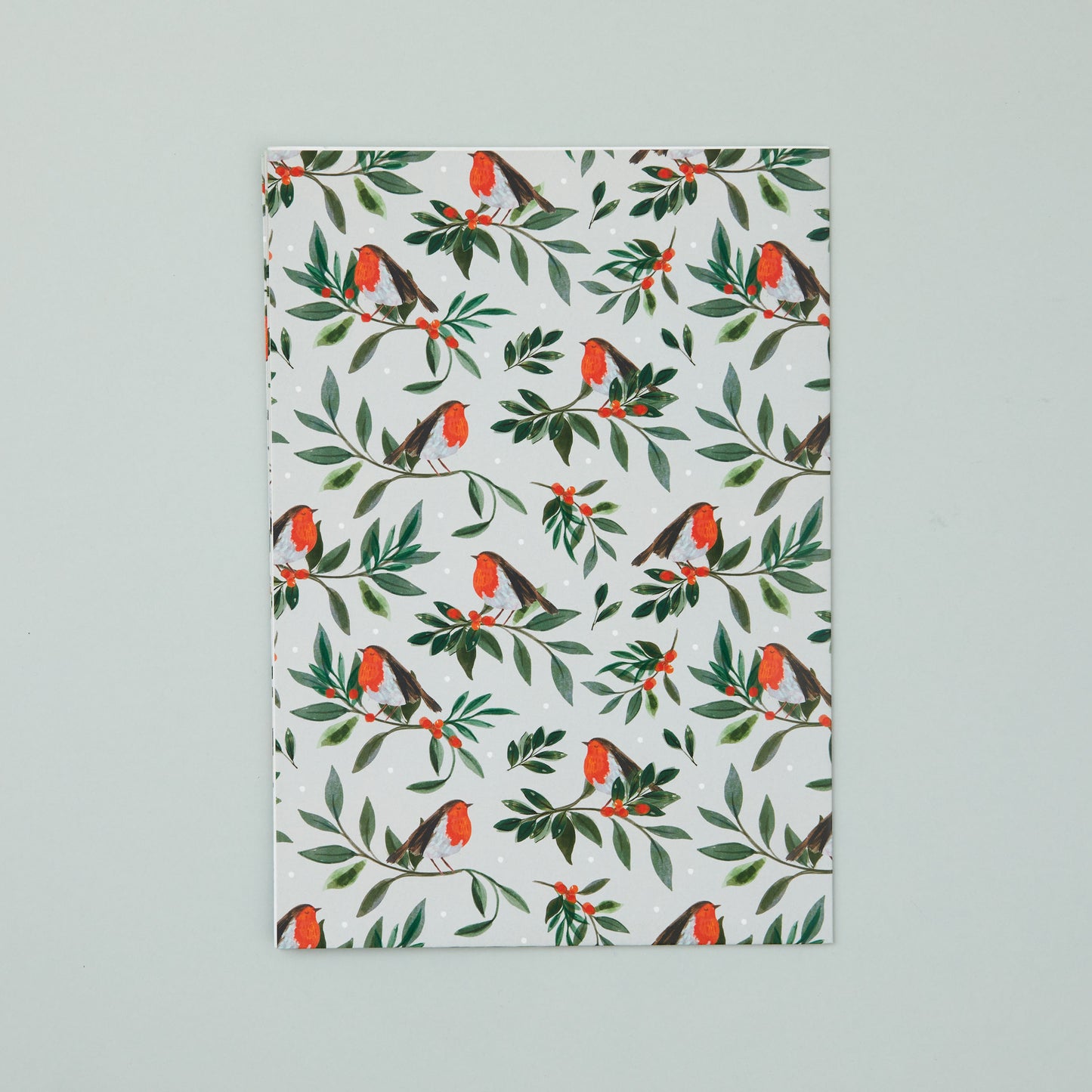 A sheet of 'Berry Bough' robin wrapping paper.