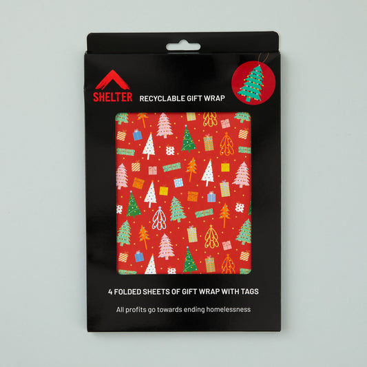 Pack of four sheets of gift wrap and matching tags packaged in a card Shelter branded box. 