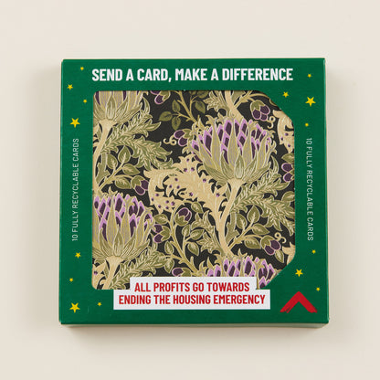 A Christmas card with gold and purple thistles illustrated on the front, the card shown in green cardboard packaging with the title: 'Send a card, make a difference'