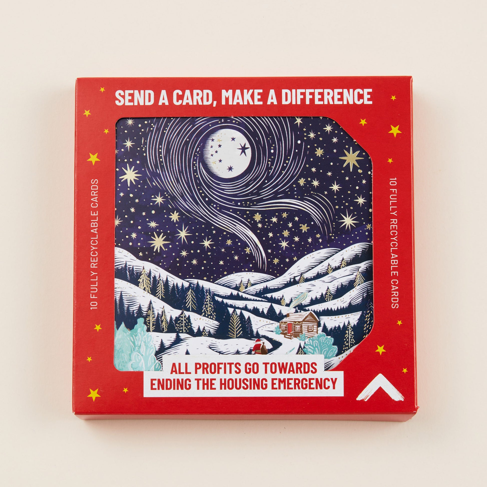 A Christmas card with a snowy mountainous scene on the front, the card shown in red cardboard packaging with the title: 'Send a card, make a difference'