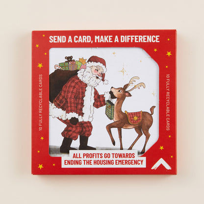 A Christmas card with Santa and a reindeer on the front, the card shown in red cardboard packaging with the title: 'Send a card, make a difference'