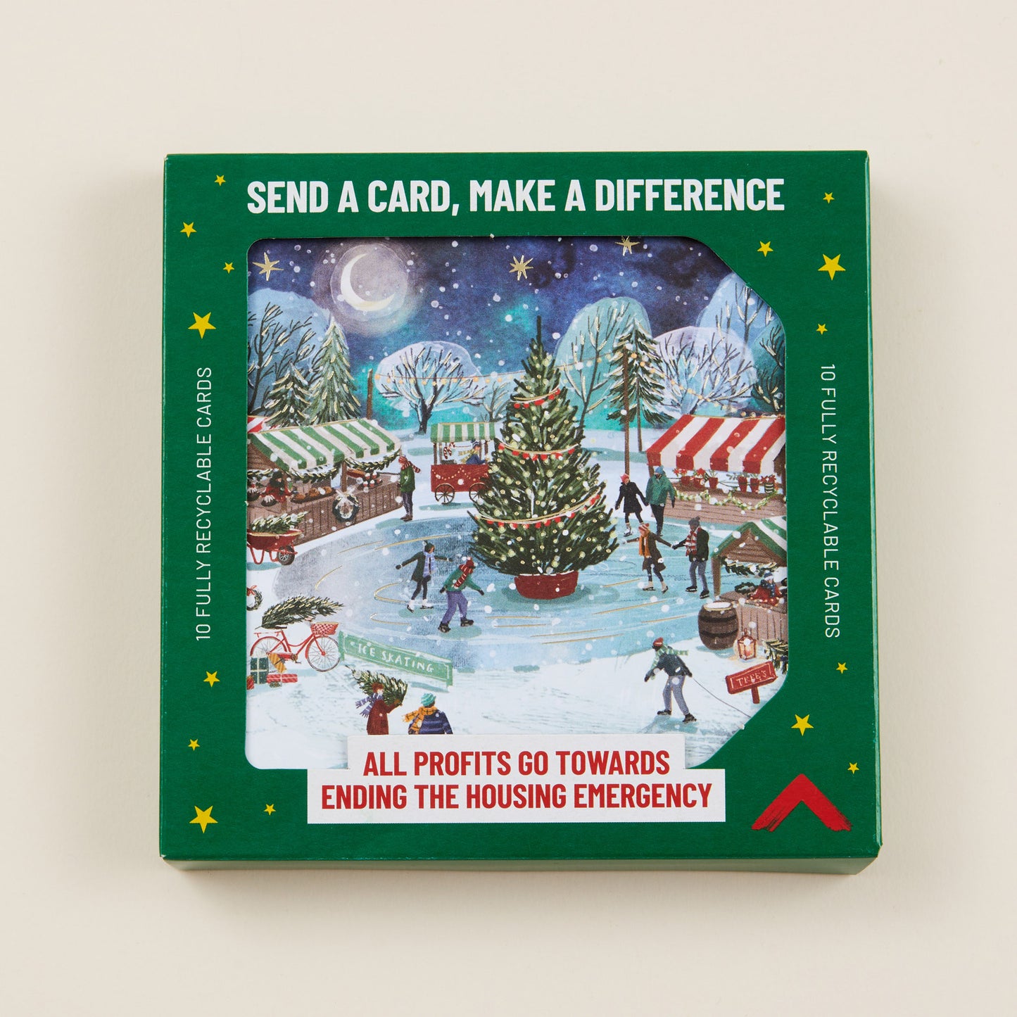 Box of Christmas cards with a winter scene illustration on a beige background