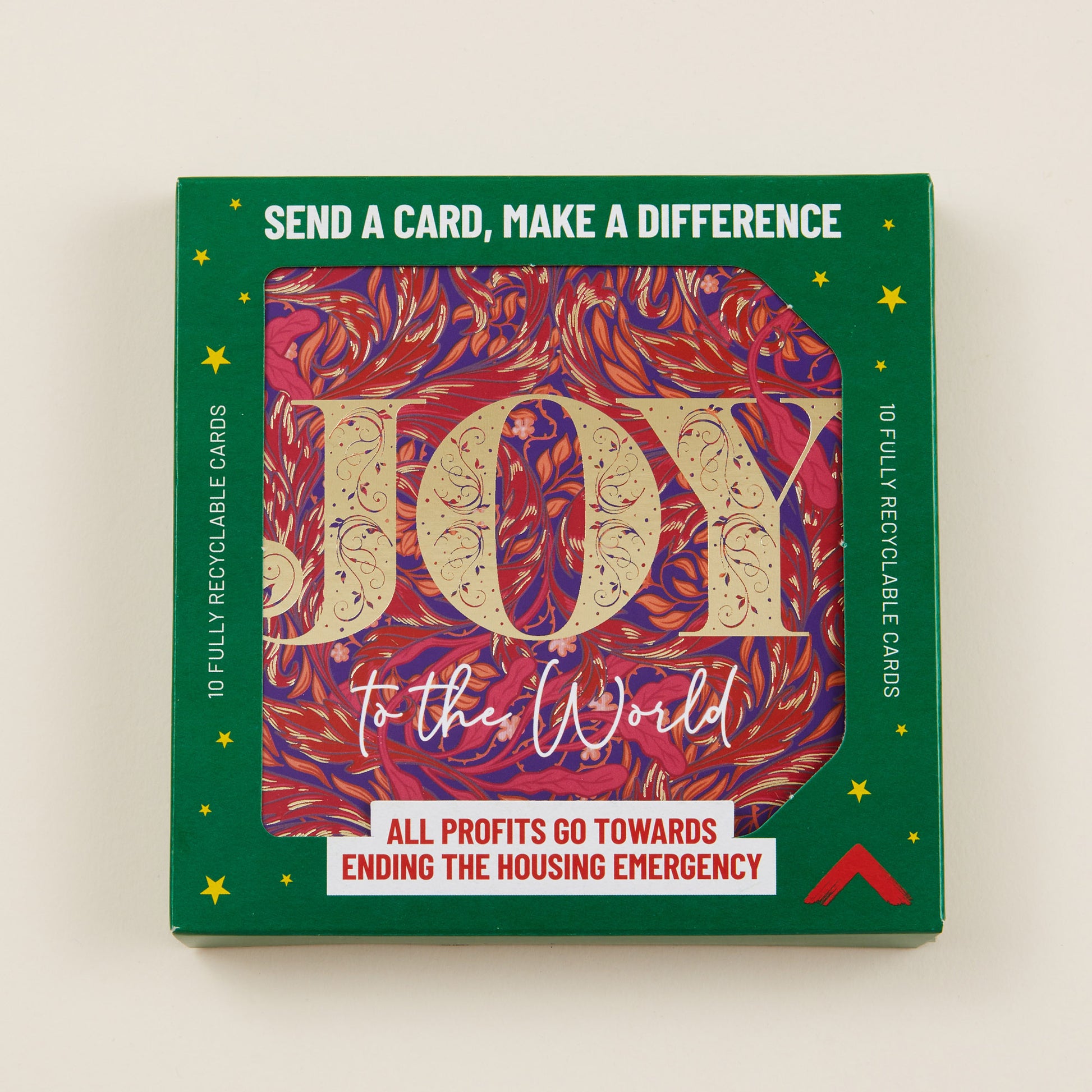 Pack of Christmas cards with 'Joy to the World' design and green border on a beige background