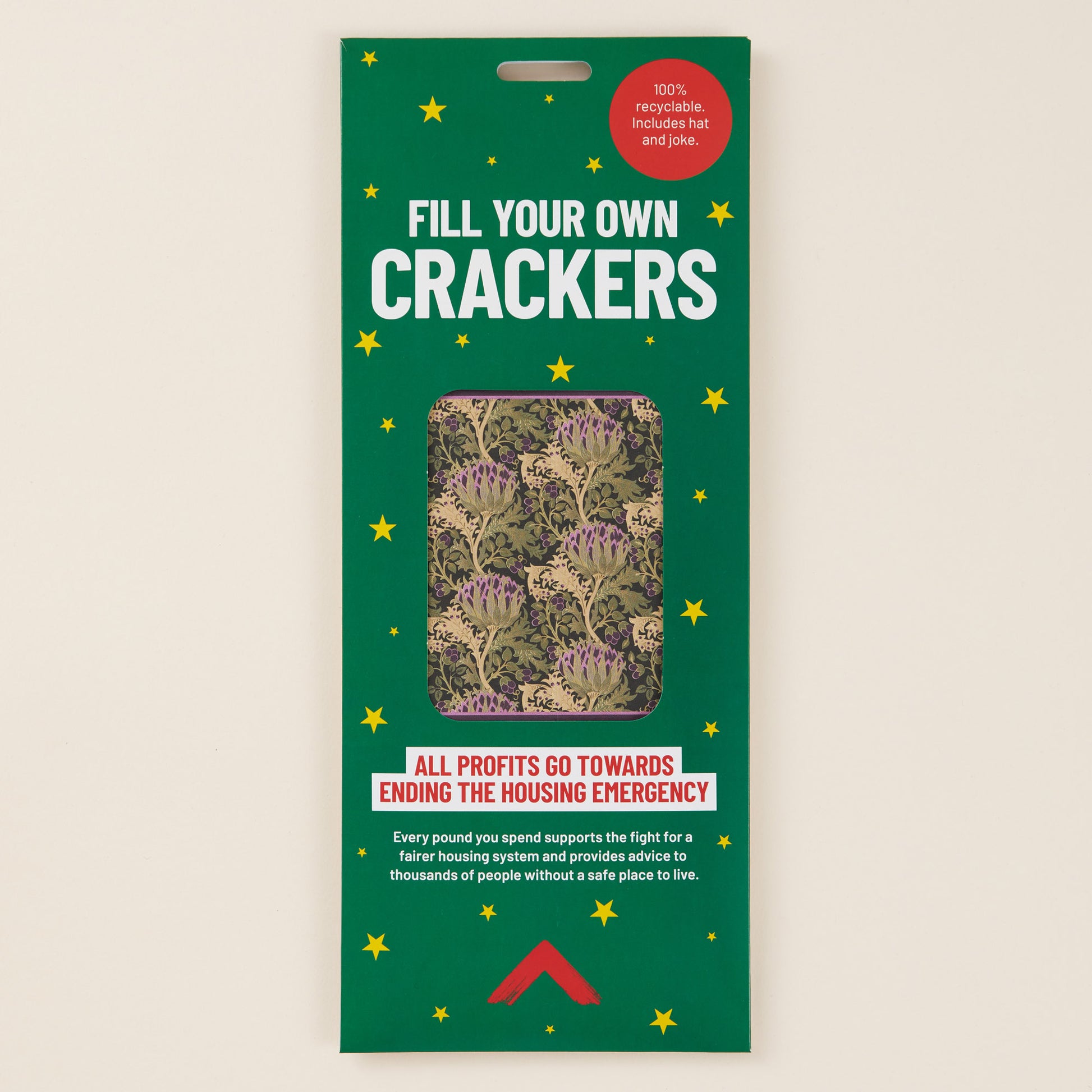 Packaging for 'Fill Your Own Crackers' with green background and star decorations.
