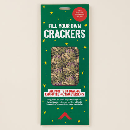 Packaging for 'Fill Your Own Crackers' with green background and star decorations.