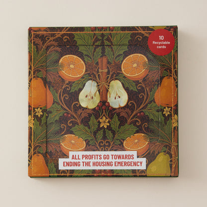 A square product box with a vintage-style botanical and fruit illustration, featuring oranges, pears, and leaves in dark green, brown, and orange tones. A red circular sticker in the top right says '10 Recyclable Cards,' and a white banner at the bottom reads 'ALL PROFITS GO TOWARDS ENDING THE HOUSING EMERGENCY.
