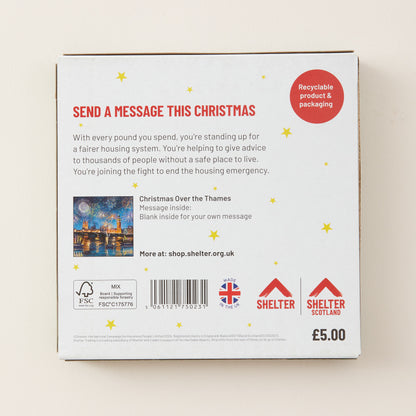 The back of a cardboard message box for Shelter, featuring a message space, a barcode, recycling and FSC logos, and a red circular badge that says 'Recyclable product & packaging'.