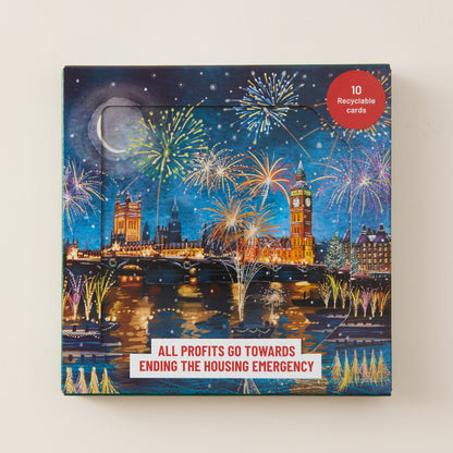 A square product box for a card set featuring an illustrated London night scene with fireworks, Big Ben, the Thames, and a red circular badge that reads '10 Recyclable cards.' Text on the box says 'ALL PROFITS GO TOWARDS ENDING THE HOUSING EMERGENCY.