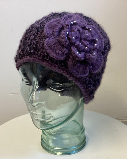 Purple knitted flower beanie hat