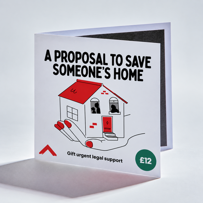 A square white card or box front with bold black text reading 'A PROPOSAL TO SAVE SOMEONE'S HOME' above a simple line drawing of a house with red roof and red hands reaching up. Smaller text says 'Gift urgent legal support' and a green circle says '£12'.