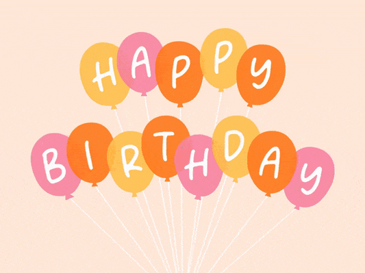 Colorful balloons spelling 'Happy Birthday' on a beige background