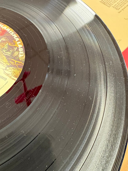 A Trick of the Tail by Genesis 12” Vinyl