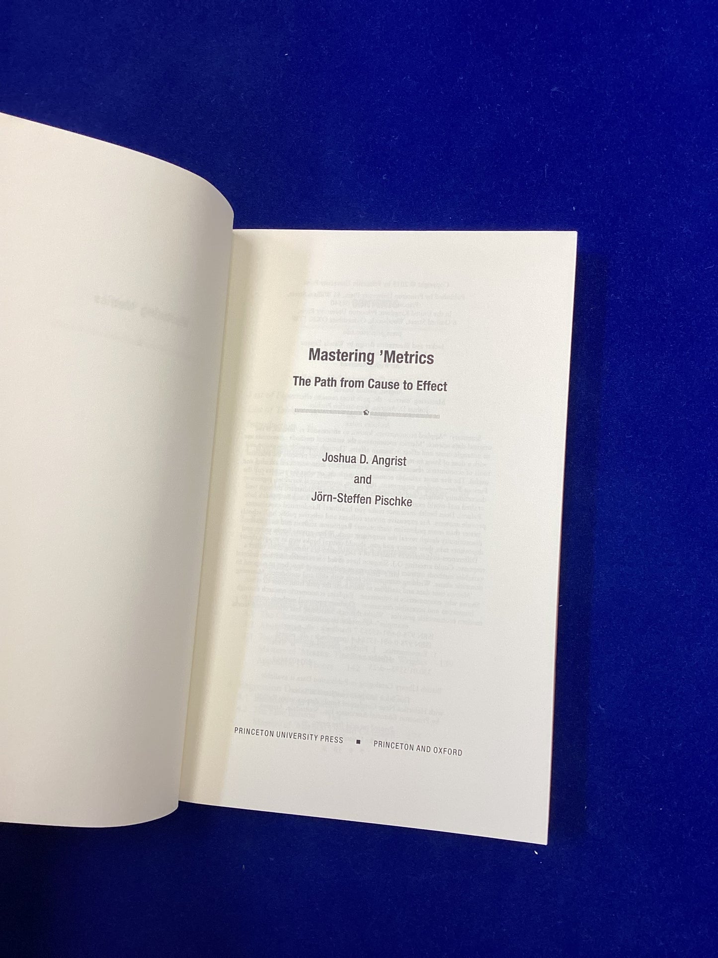 Mastering Metrics: the path from cause to effect, J.D. Angrist & J Pischke, 2015.