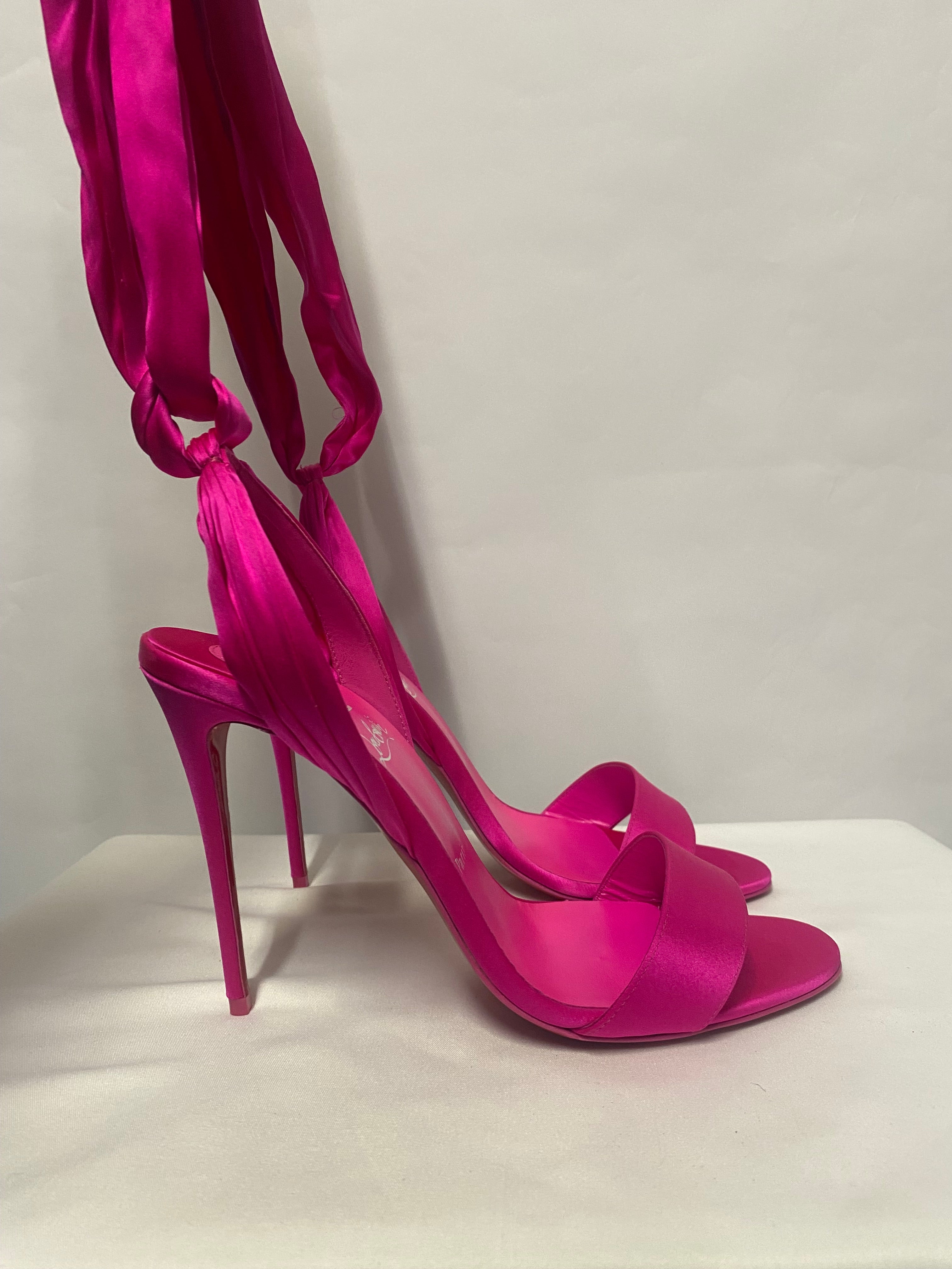 Christian louboutin hot sale pink heels