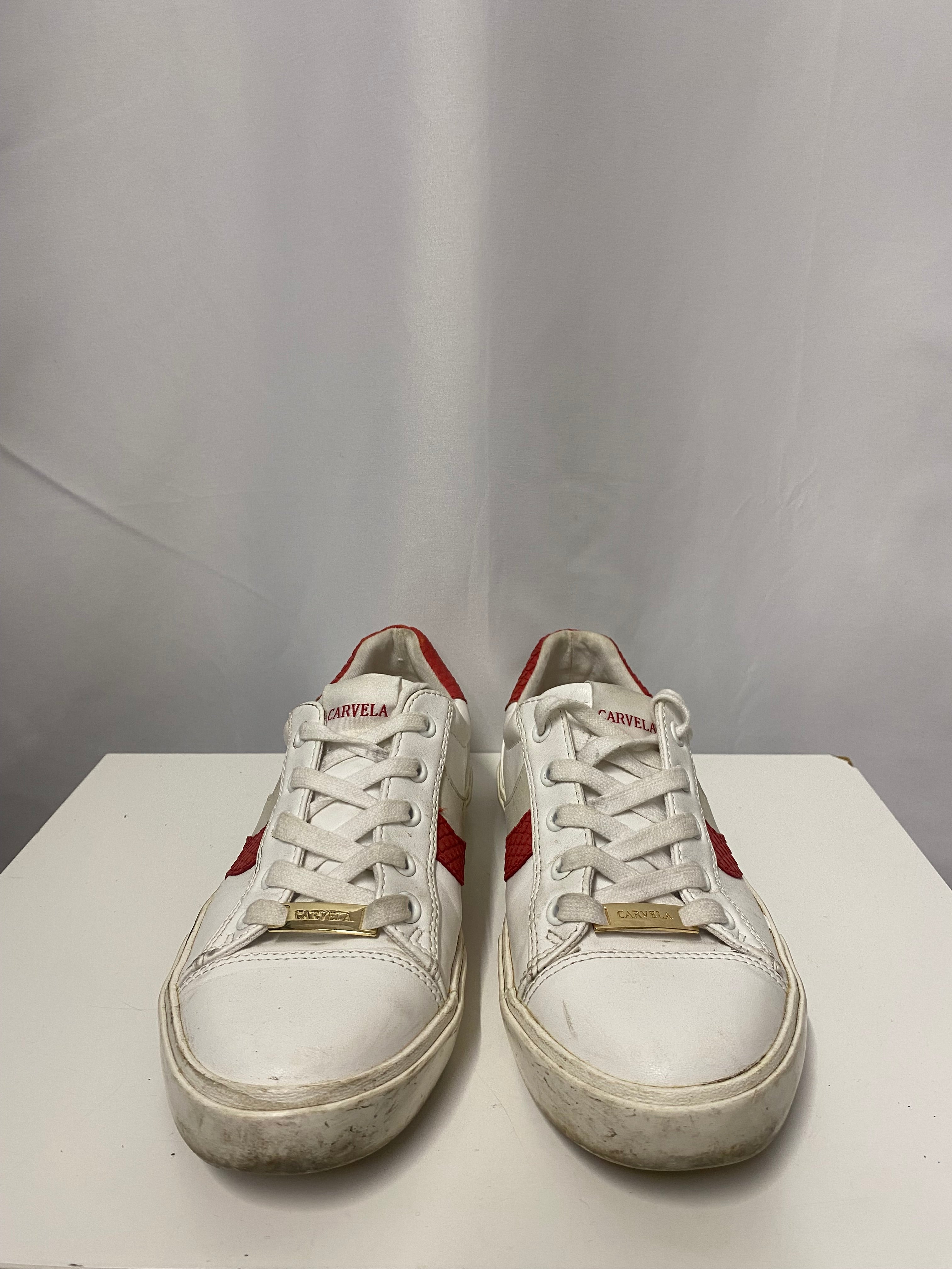 Carvela store red trainers