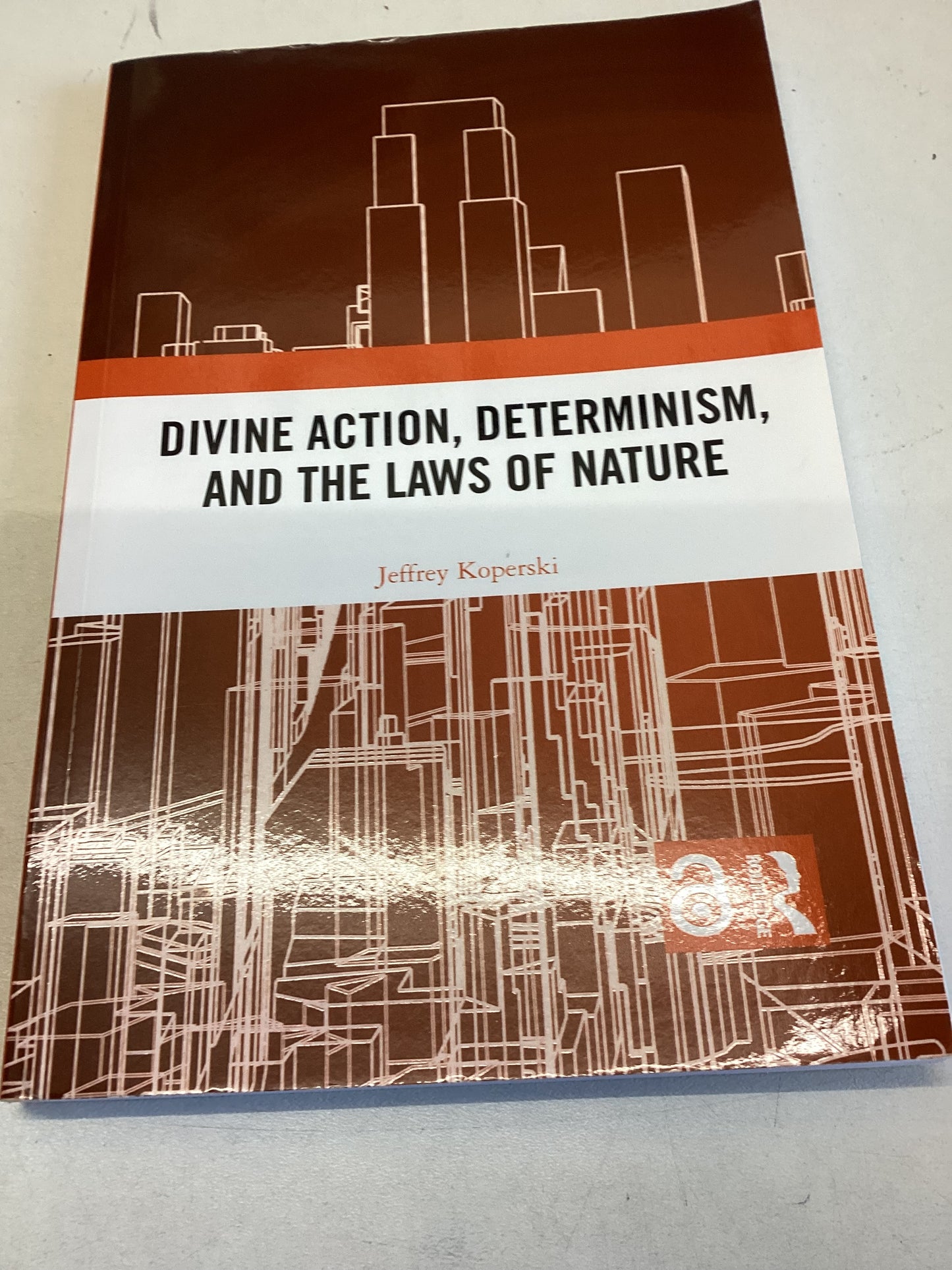 Divine Action, Determinism, and The Laws of Nature Jeffrey Koperski