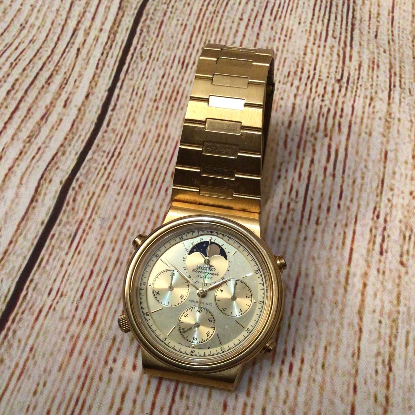 Seiko 7A48-5000 Quartz Chronograph Moon Phase Sports 100 Gold Tone Watch (untested)