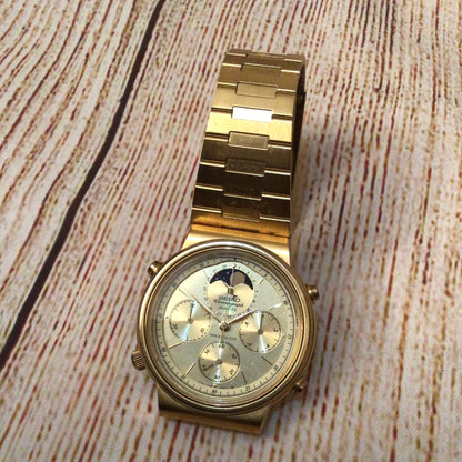 Seiko 7A48-5000 Quartz Chronograph Moon Phase Sports 100 Gold Tone Watch (untested)