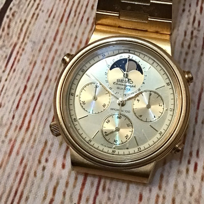 Seiko 7A48-5000 Quartz Chronograph Moon Phase Sports 100 Gold Tone Watch (untested)