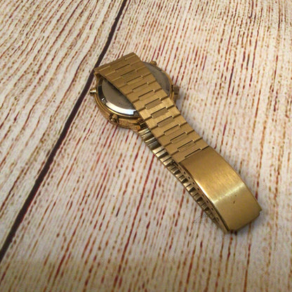 Seiko 7A48-5000 Quartz Chronograph Moon Phase Sports 100 Gold Tone Watch (untested)