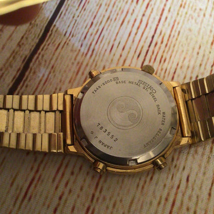Seiko 7A48-5000 Quartz Chronograph Moon Phase Sports 100 Gold Tone Watch (untested)