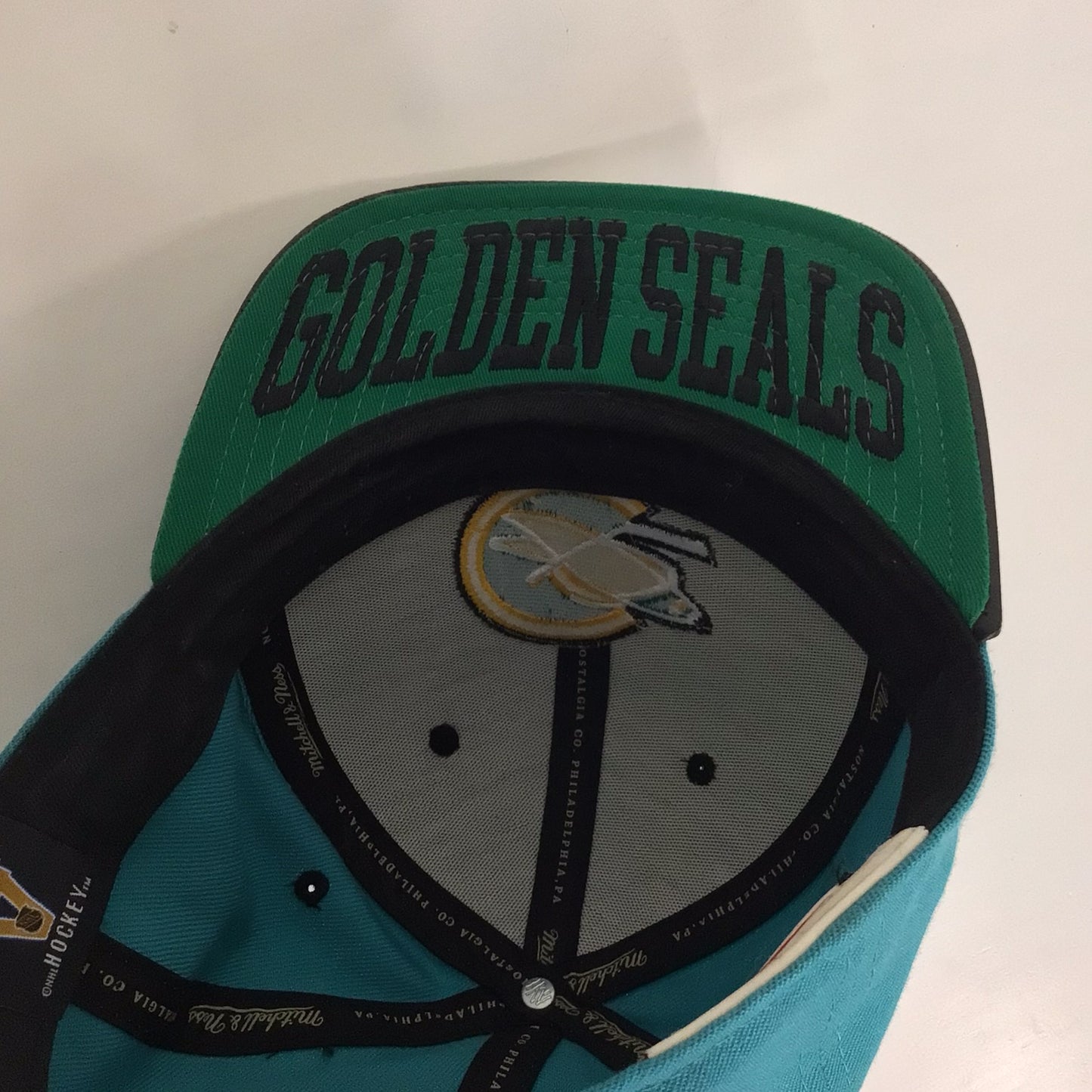 Mitchell & Ness Blue & Black Golden Seals Snapback Hat Cap