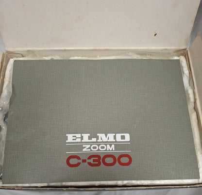 ELMO ZOOM C-300 camera and Double Super 8 Magazine