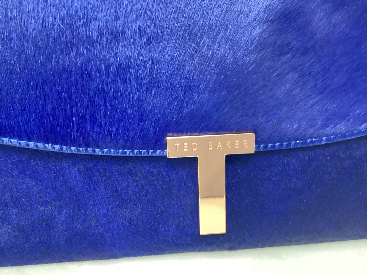Blue Ted Baker Clutch Bag, Pony Hair, Gold Accents and Dog printed material inside lining