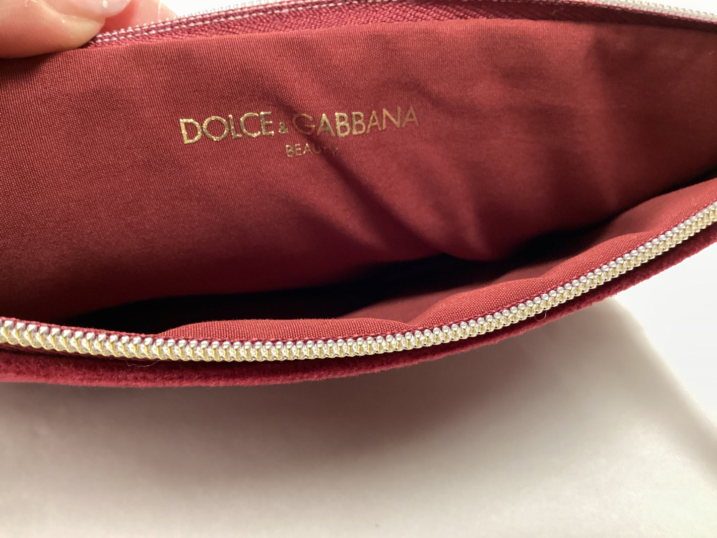 Dolce and Gabbana new cosmetic bag burgundy with black box